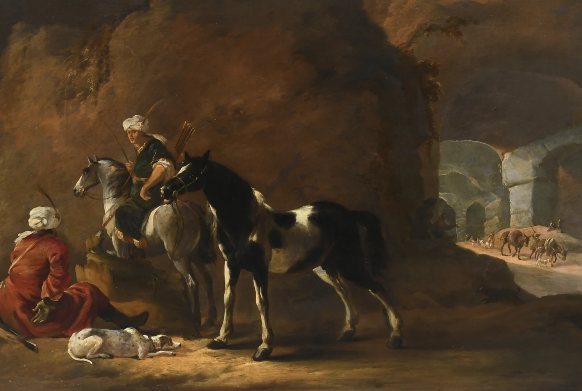 Oriental horsemen in a cave with drovers and their animals